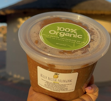 Belly Buster Polokwane — 100% organic homemade tub held in hand